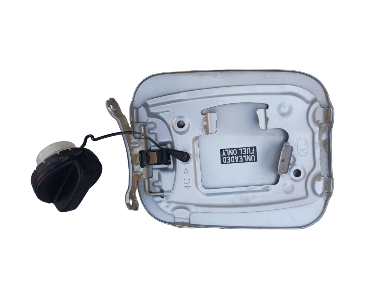 Tapas de bencina interior y exterior del Toyota Corolla 2010 sedán